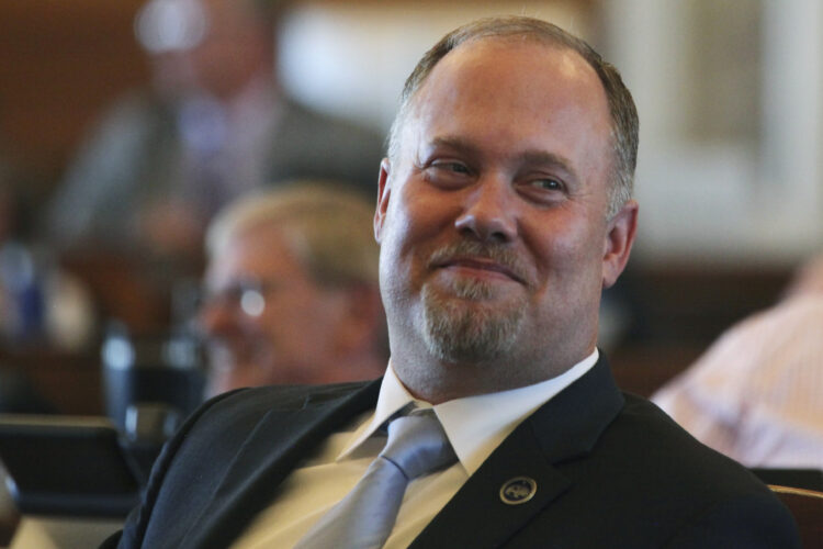 Kansas lawmakers scuttle a plan for cutting taxes, defying the governor